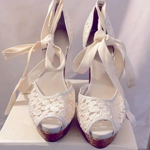 Nine West white ankle tie wedges.